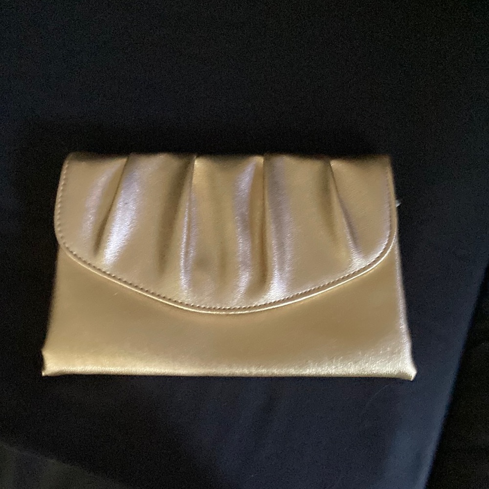 Gold handbag purse button close gently used